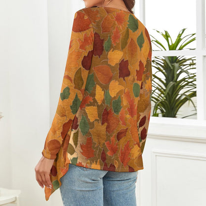 The backside of a woman wearing a colorful leaf-patterned shirt in a room with a plant. - Printspirationz
