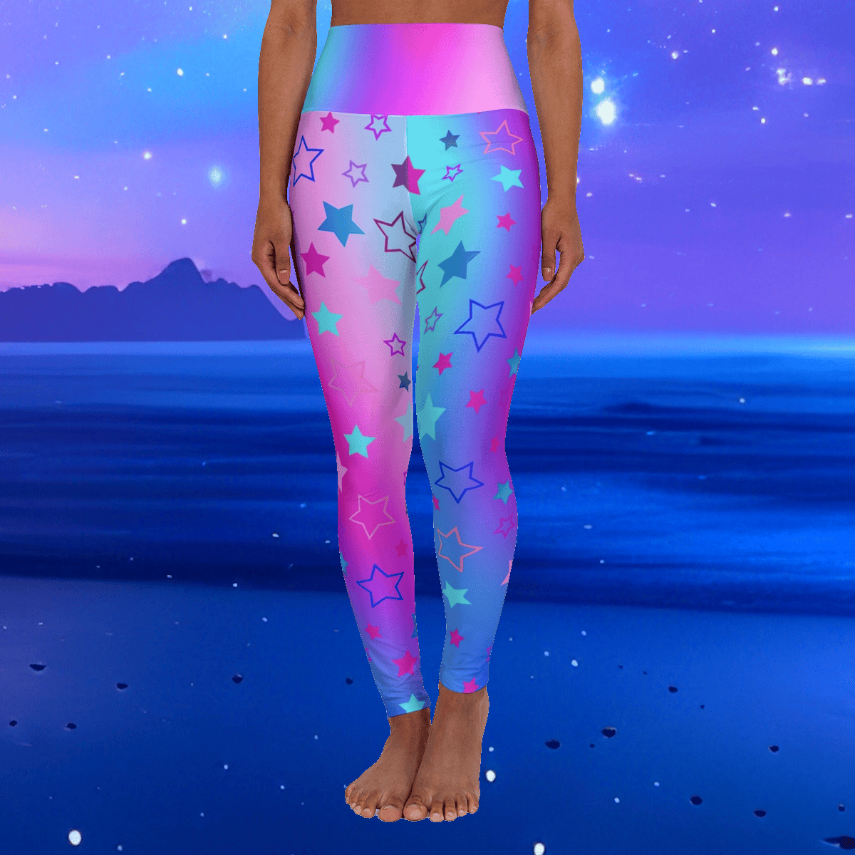 Woman wearing high waist yoga leggings with colorful cool tones star patterns on a blue and pink gradient background - Printspirationz