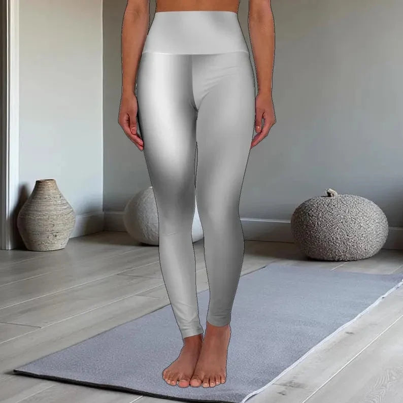 Woman in Vibrant Gradient Black High Waist Yoga Leggings standing on a wooden floor with grey wall background - Printspirationz