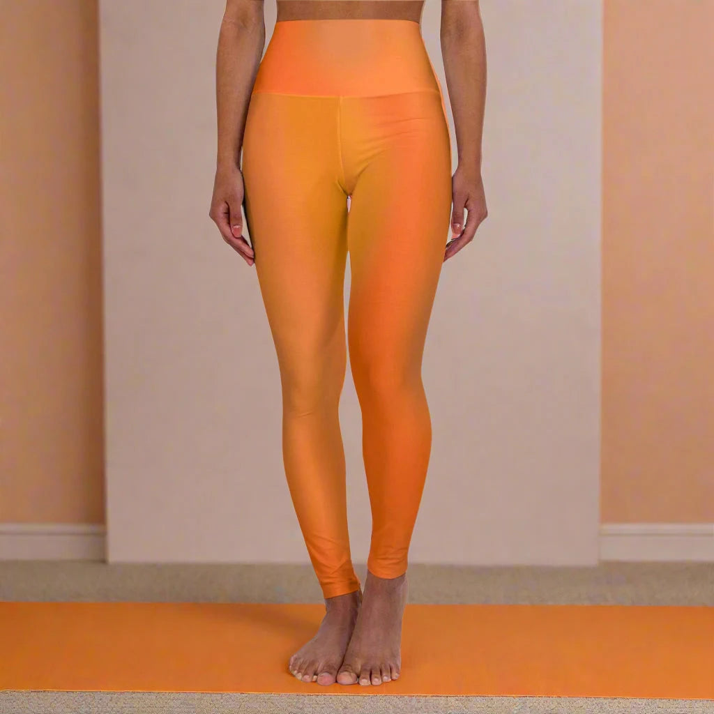 Woman wearing bright Gradient Orange High Waist Yoga Leggings  on a neutral background - Printspirationz