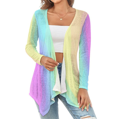 Woman wearing a gradient pastel rainbow cardigan over a white top and blue jeans on a white background -Printspirationz